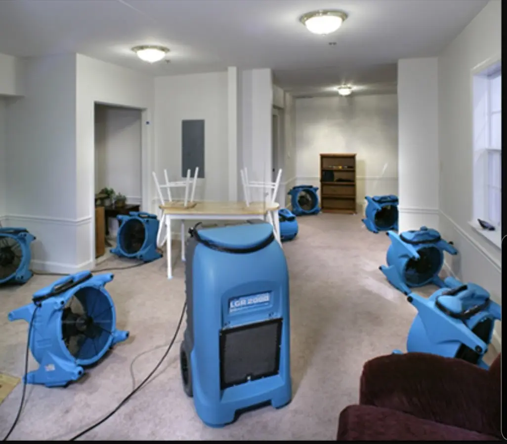 Air movers and dehumidifier setup for Water Damage Restoration in Wasco